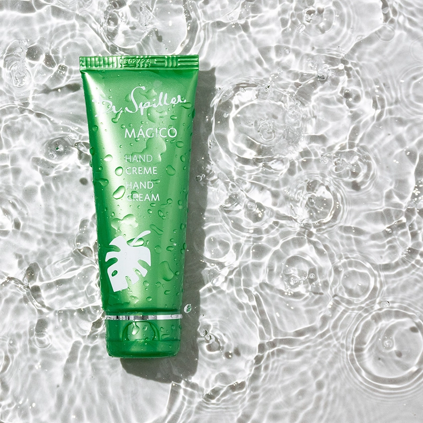 MAGICO hand cream lies in clear water