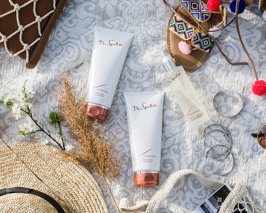 Sun care Summer Glow tubes placed decoratively
