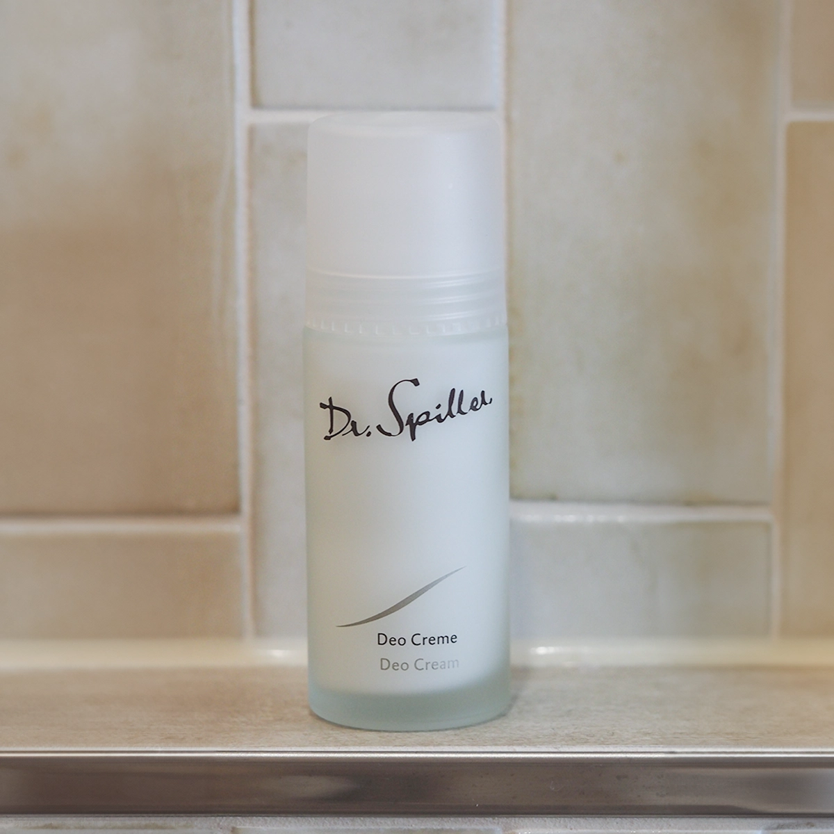 Deodorant cream on the shelf in the bathroom