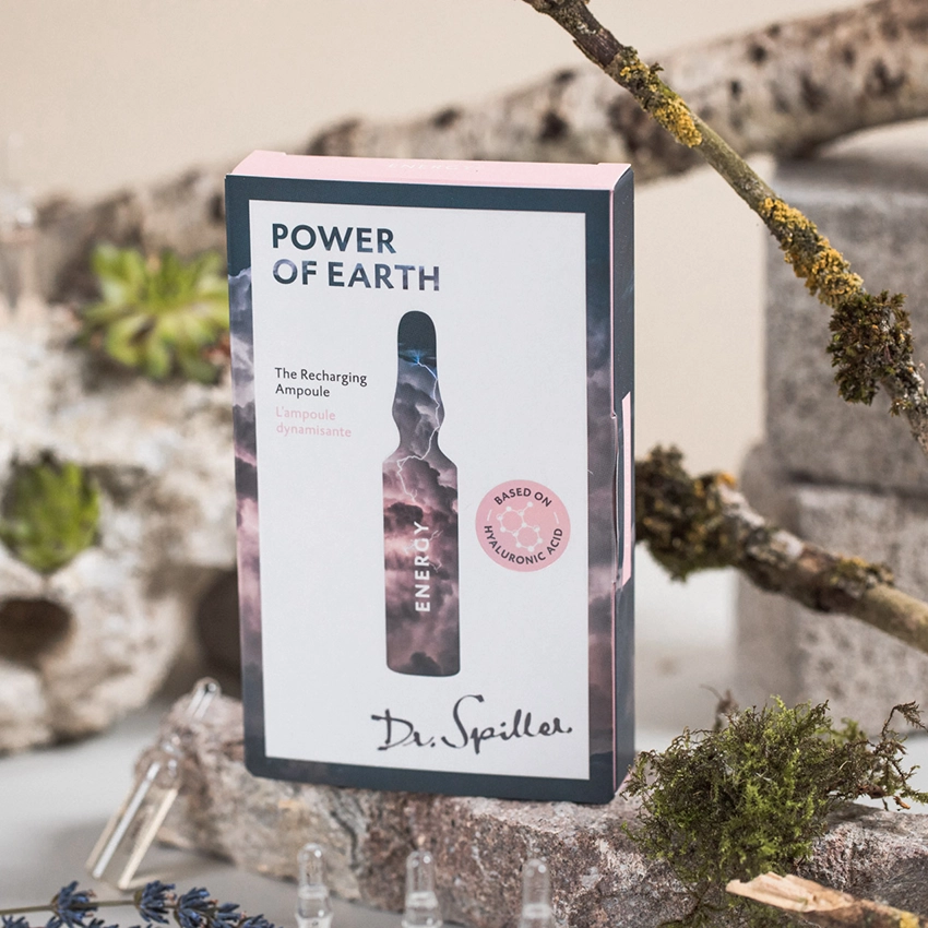 The Recharging Ampoule on decorative background