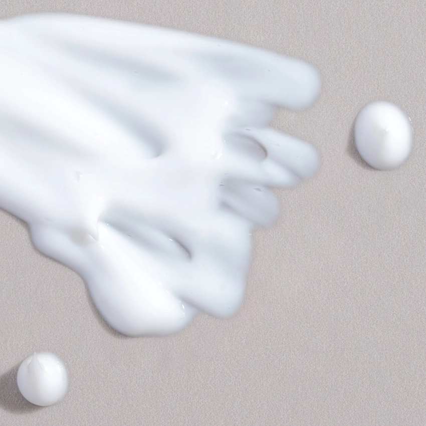 Close-up texture - white, milky cleaning