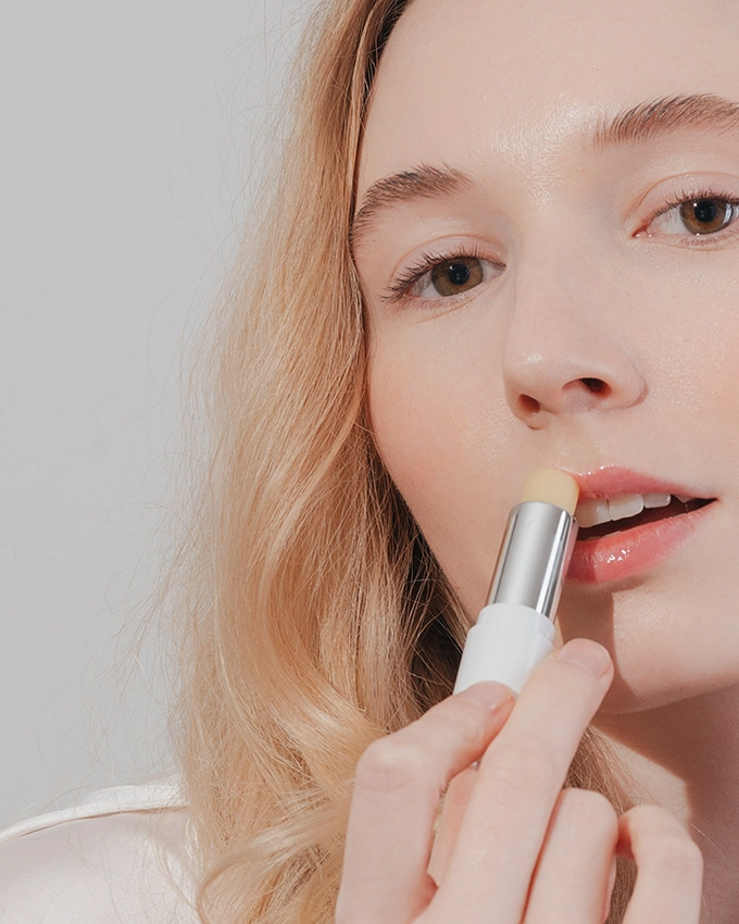 Aloe Vera Lip Balm SPF30 on woman's lips