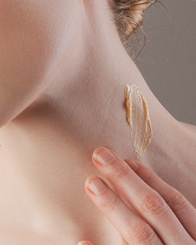 Creamy skin care product Application on the neck