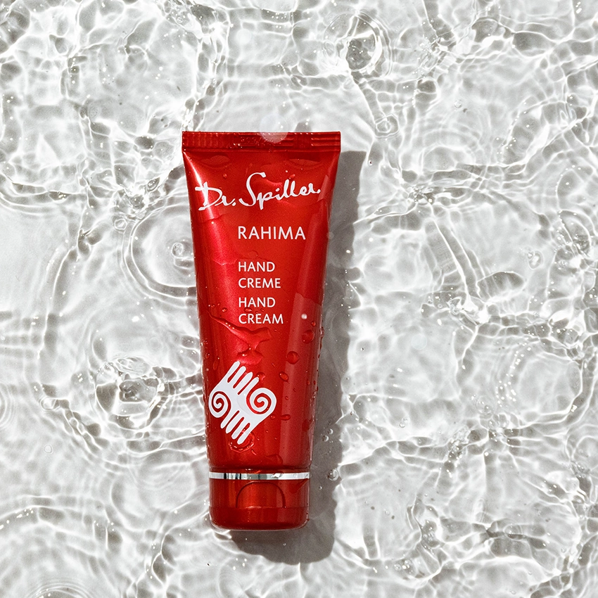Rahima hand cream lies in the clear water